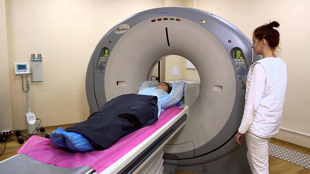 Проведение компьютерной томографии Проведение компьютерной томографии